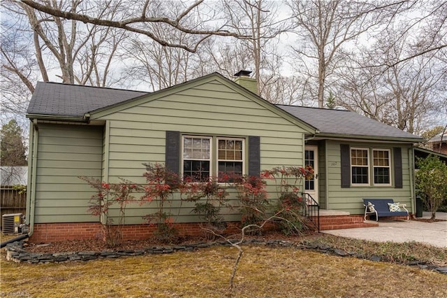 back of house featuring a patio and central air condition unit