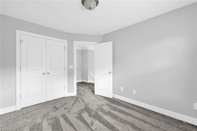 1604 Sunny Hill Way, Colfax, NC 27235 - unfurnished bedroom featuring carpet floors, a closet, and baseboards