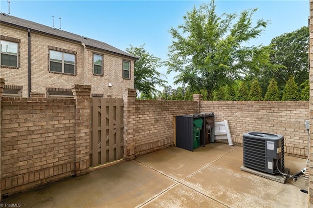 1604 Sunny Hill Way, Colfax, NC 27235 - view of patio with fence, cooling unit, and a gate