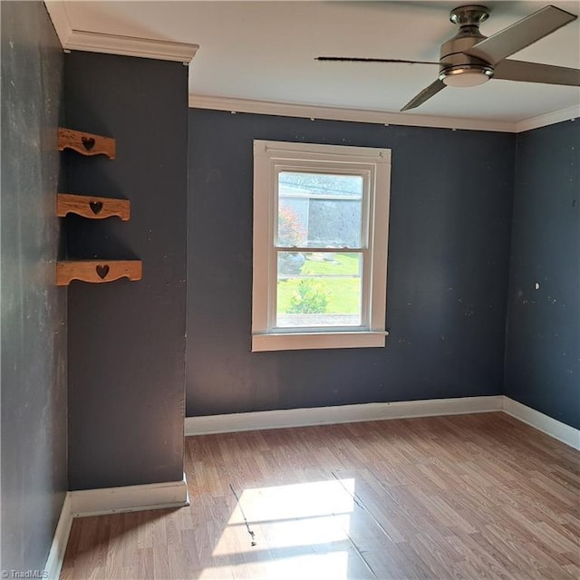 5426 Cedarbrook Rd, Jonesville, NC 28642 - empty room featuring wood finished floors, baseboards, a ceiling fan, and ornamental molding