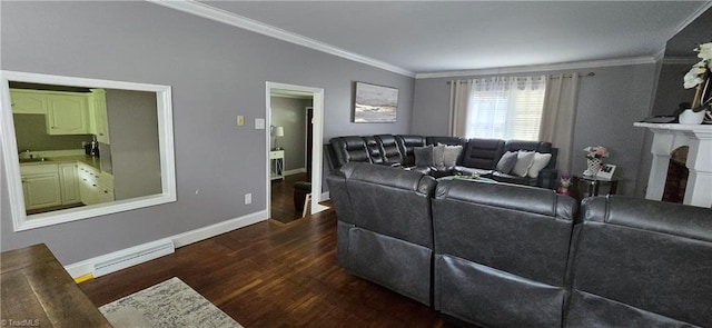 3613 Mcconnell Rd, Greensboro, NC 27405 - living area featuring ornamental molding, wood finished floors, baseboard heating, and a fireplace