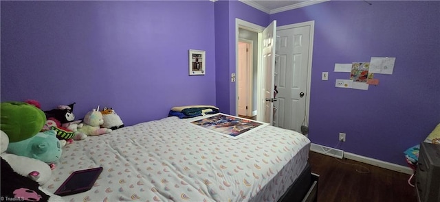 3613 Mcconnell Rd, Greensboro, NC 27405 - bedroom with dark wood-type flooring and ornamental molding