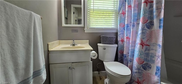 3613 Mcconnell Rd, Greensboro, NC 27405 - bathroom with vanity and shower / tub combo with curtain