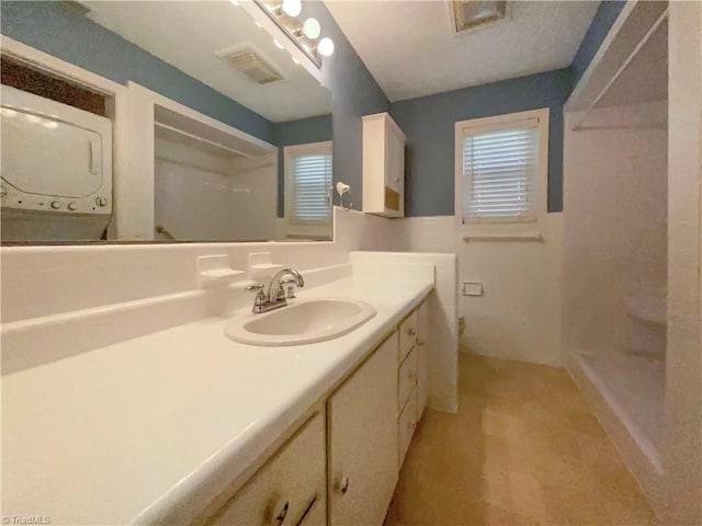 full bathroom with visible vents and vanity