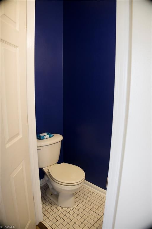 bathroom with tile patterned floors and toilet