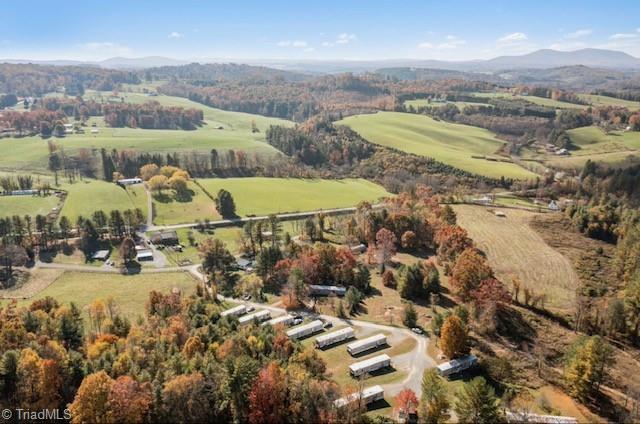 aerial view featuring a mountain view