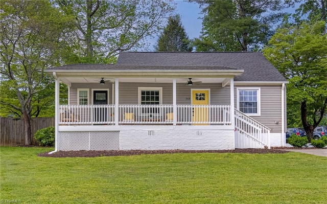 bungalow-style home featuring a porch, ceiling fan, and fence