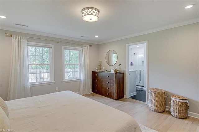 bedroom featuring crown molding, light wood-type flooring, visible vents, and recessed lighting