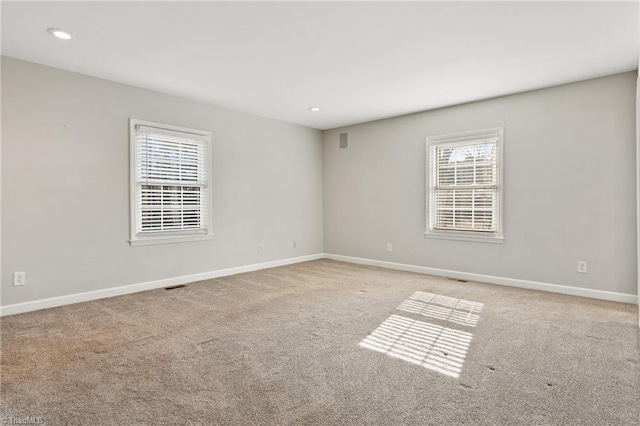 view of carpeted spare room