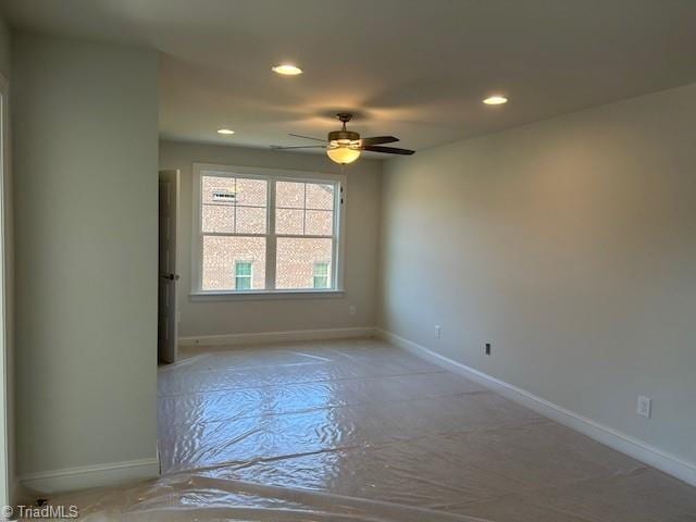 empty room featuring ceiling fan