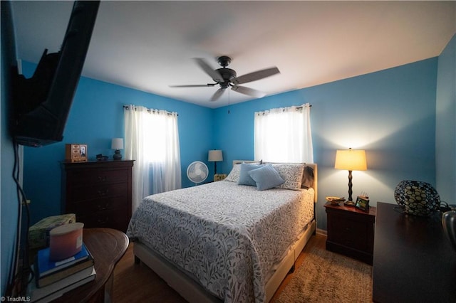 bedroom featuring ceiling fan and wood-type flooring