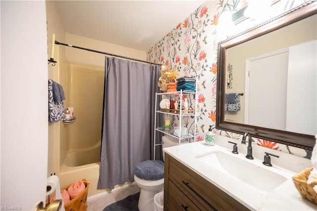 full bathroom with shower / tub combo, vanity, and toilet