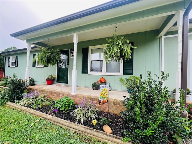 doorway to property with covered porch