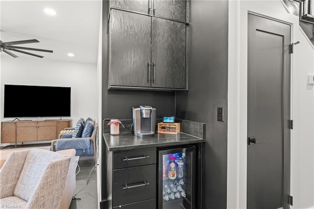 bar featuring ceiling fan and beverage cooler