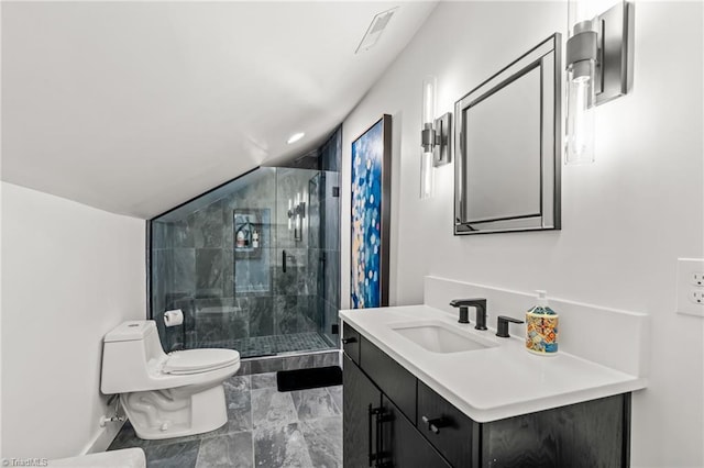 bathroom with toilet, vanity, a shower with door, and lofted ceiling