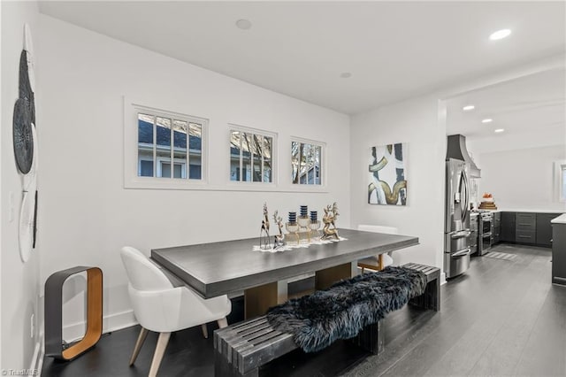 dining room with dark hardwood / wood-style floors