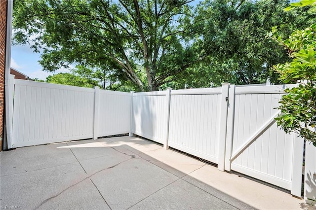 319 Hanover Arms Ct, Winston-Salem, NC 27104 - view of patio / terrace with a gate