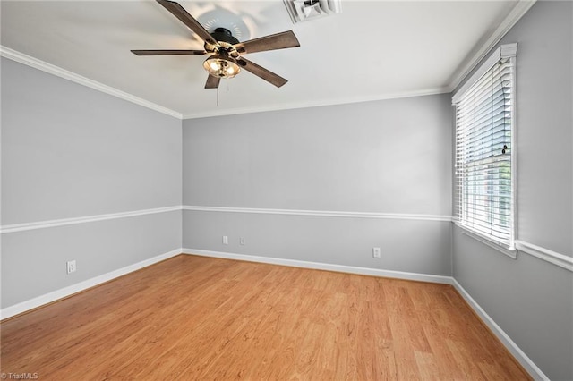 319 Hanover Arms Ct, Winston-Salem, NC 27104 - empty room featuring healthy amount of natural light, light wood-style flooring, ornamental molding, baseboards, and ceiling fan
