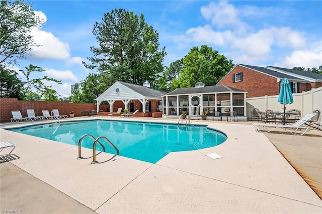 319 Hanover Arms Ct, Winston-Salem, NC 27104 - community pool featuring a patio and a sunroom