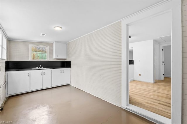 kitchen with sink and white cabinets