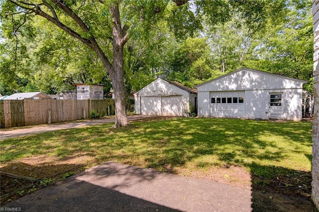 1900 Peachtree St, Winston-Salem, NC 27107 - view of yard with a detached garage and an outbuilding