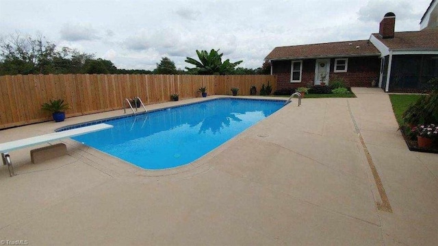 view of swimming pool featuring a patio