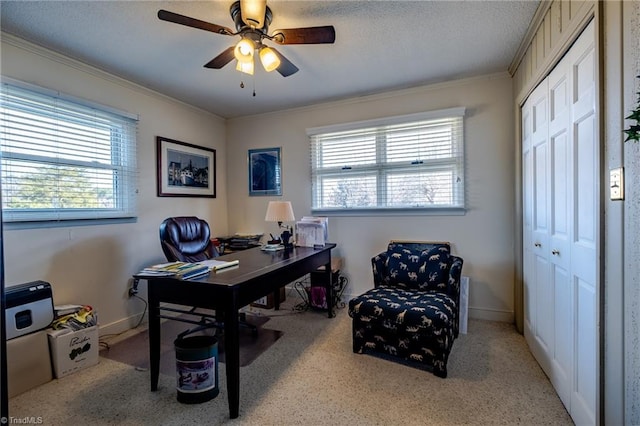 office area featuring ornamental molding and ceiling fan