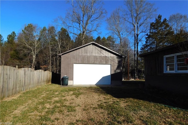 garage with a yard