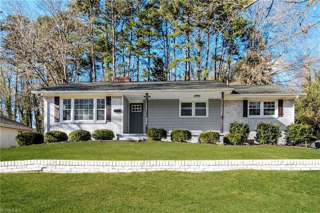 3027 Kinnamon Rd, Winston-Salem, NC 27104 - ranch-style house with a front lawn and a chimney