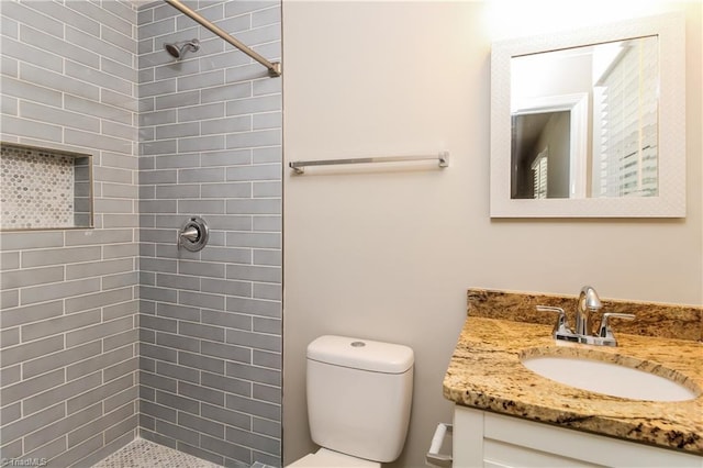3027 Kinnamon Rd, Winston-Salem, NC 27104 - bathroom with a tile shower, toilet, and vanity