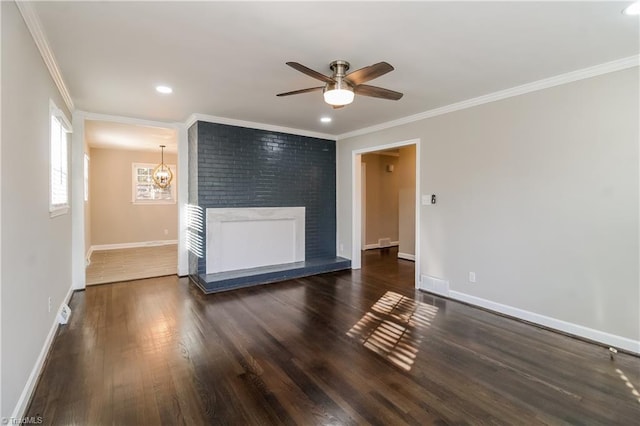 3027 Kinnamon Rd, Winston-Salem, NC 27104 - unfurnished living room featuring a fireplace, ceiling fan, wood finished floors, crown molding, and recessed lighting