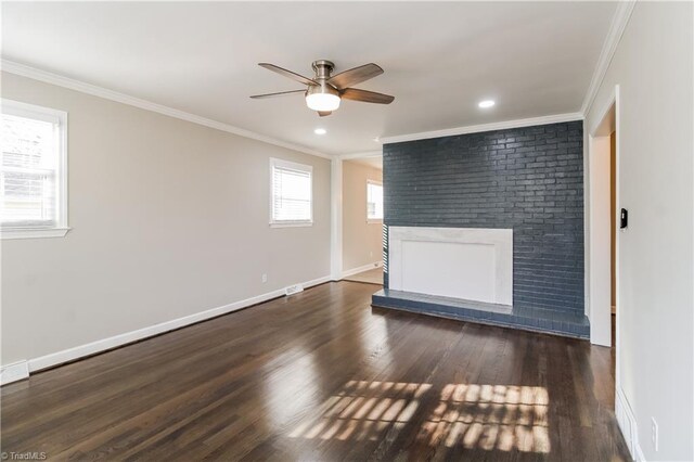 3027 Kinnamon Rd, Winston-Salem, NC 27104 - empty room with a fireplace, ornamental molding, ceiling fan, wood finished floors, and baseboards