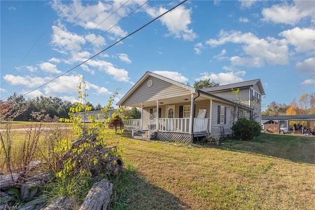 view of front of house with a front lawn and a porch