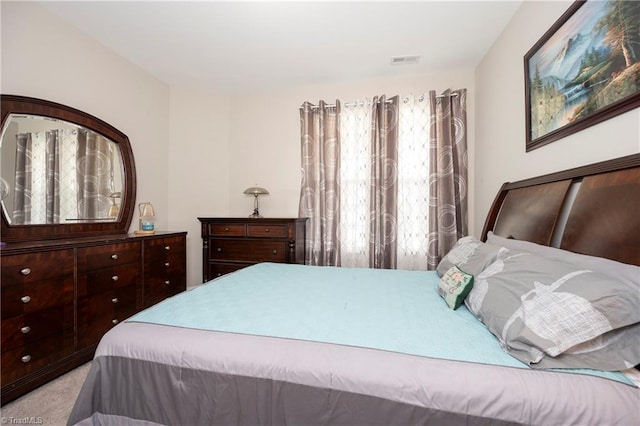 410 Mountain Grove Ln, Kernersville, NC 27284 - bedroom featuring multiple windows and light colored carpet