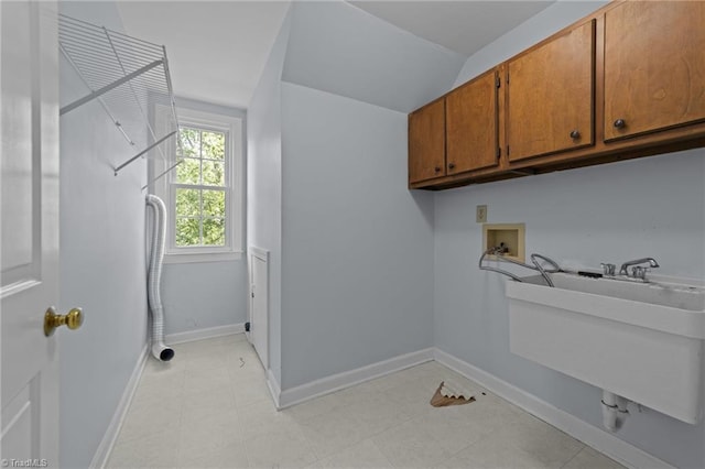 1203 Westminster Dr, Greensboro, NC 27410 - laundry area featuring cabinet space and hookup for a washing machine
