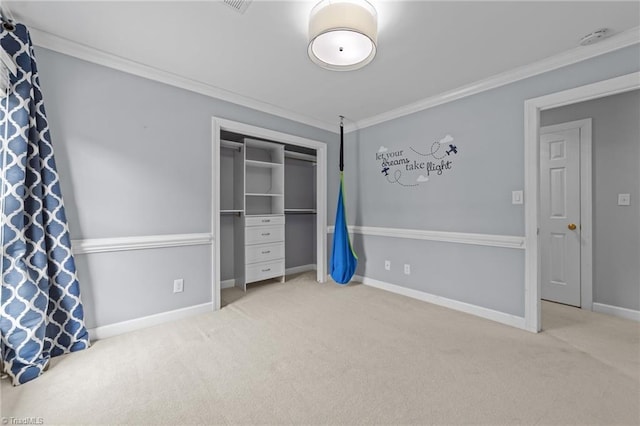 1203 Westminster Dr, Greensboro, NC 27410 - unfurnished bedroom with carpet flooring, ornamental molding, and a closet