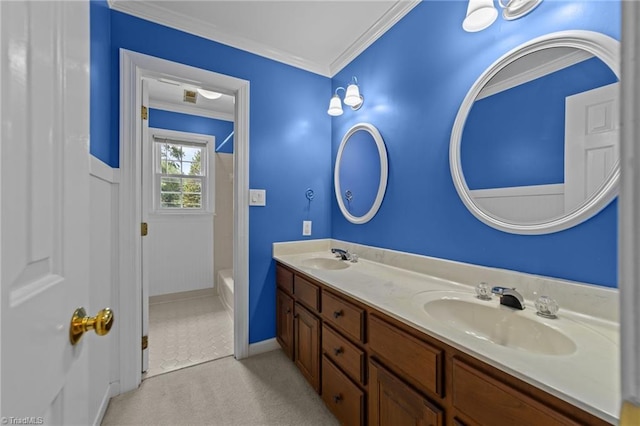 1203 Westminster Dr, Greensboro, NC 27410 - bathroom with double vanity, shower / bathtub combination with curtain, and crown molding