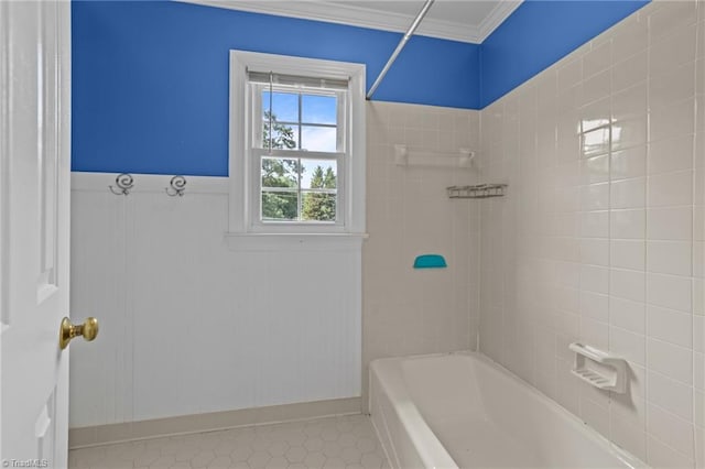 1203 Westminster Dr, Greensboro, NC 27410 - full bathroom featuring crown molding, tile patterned flooring, washtub / shower combination, and a wainscoted wall