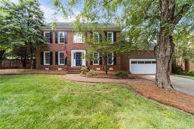 1203 Westminster Dr, Greensboro, NC 27410 - view of front of home with concrete driveway and brick siding