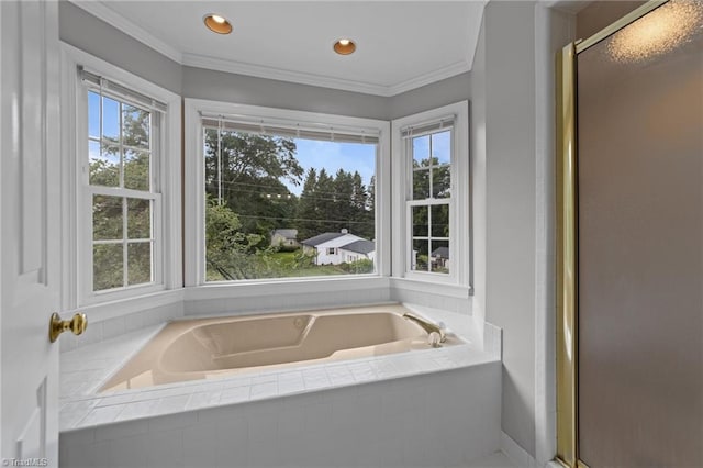 1203 Westminster Dr, Greensboro, NC 27410 - full bathroom featuring a garden tub, crown molding, a shower stall, and recessed lighting
