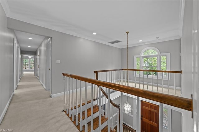 1203 Westminster Dr, Greensboro, NC 27410 - hall featuring carpet flooring, recessed lighting, an upstairs landing, crown molding, and a chandelier