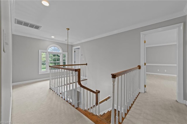 1203 Westminster Dr, Greensboro, NC 27410 - hallway featuring an upstairs landing, carpet, crown molding, and recessed lighting