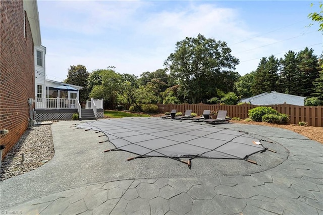 1203 Westminster Dr, Greensboro, NC 27410 - view of pool featuring a deck and a patio