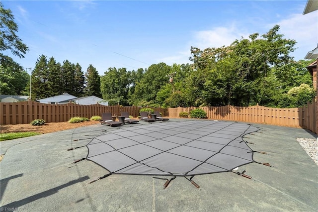 1203 Westminster Dr, Greensboro, NC 27410 - view of swimming pool with a patio and a fenced backyard