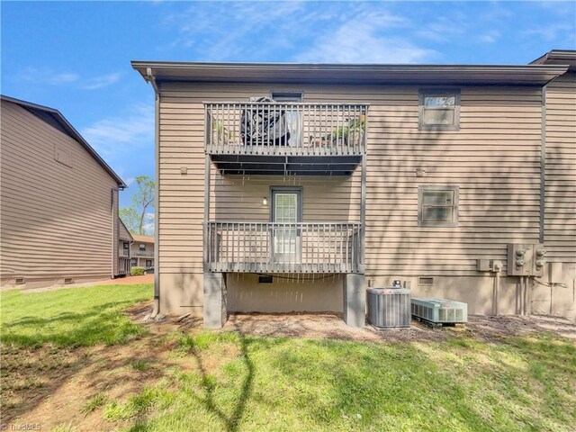 230 Vista Cir Unit B, Winston-Salem, NC 27106 - rear view of house featuring a yard, cooling unit, and a balcony