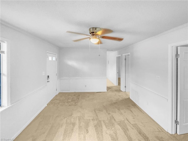 230 Vista Cir Unit B, Winston-Salem, NC 27106 - empty room featuring a textured ceiling, light colored carpet, a ceiling fan, and visible vents