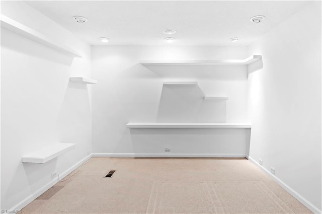 881 Brookleigh Ct, Winston-Salem, NC 27104 - walk in closet with carpet flooring