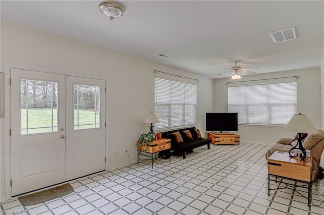 4317 Bradbury Way, High Point, NC 27265 - entrance foyer featuring ceiling fan and french doors