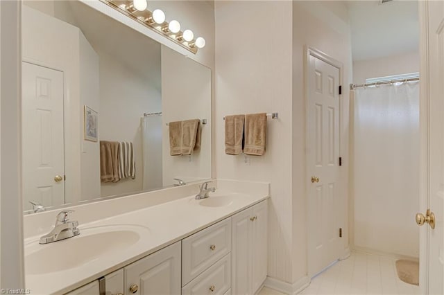 4317 Bradbury Way, High Point, NC 27265 - bathroom featuring double vanity, tile patterned floors, and a shower with curtain