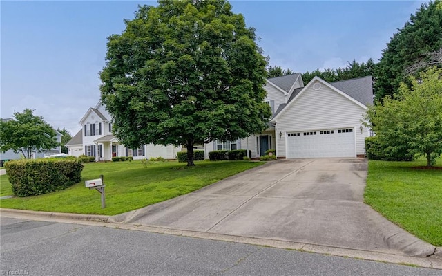 4317 Bradbury Way, High Point, NC 27265 - view of front of house with a garage, driveway, and a front lawn